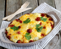 Gratin de chou-fleur et jambon de Serrano à la mimolette