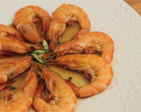 Crevettes sautées sauce rouge