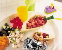 Mini-papillotes de dinde aux légumes et aux herbes