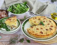 Typique de la cuisine napolitaine et sicilienne, il s'agit d'une tourte de pommes de terre farcie au jambon et à la mozzarella qu'en Italie on appelle "gâteau…