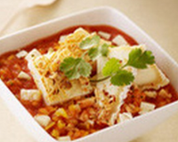 Risotto de blanc de seiche, jus de tomate et Pouligny Saint Pierre, huile vierge de coriandre et amandes grillées