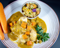 Cuisse de poulet et ses petits légumes sauce curry