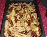 Des rillauds (spécialitée charcutière de l'Anjou, appelés aussi "rillons"), revenus avec des petites échalottes ciselés et des pommes de terre, le tout recouvert d'un…
