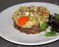 Craquez pour ce délicieux parmentier de canard aux Flageolets et éclats de noisette.