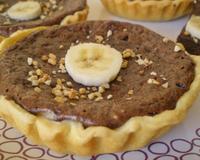 Des tartelettes simple et rapide qui associent la banane au fondant du chocolat et au craquant du pralin. un délice !