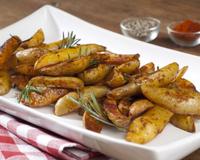 Craquez pour des mini quartiers de pommes de terre délicieusement épicées !