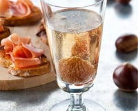 Cocktail au marron glacé et tranches de pain tomate et ail au jambon Serrano