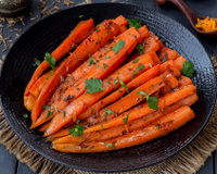 Cyril Lignac partage sa recette des carottes vichy au miel, un accompagnement gourmand et économique pour les fêtes !