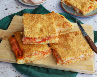 Pizza parigina :  découvrez cette recette napolitaine au jambon ultra gourmande qui cache un cœur fondant sous la pâte feuilletée