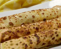 Roulés de crêpes pommes, poires et miel