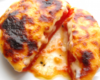 Des tomates farcies d'une béchamel au fromage, un régal, délicieusement fondant...