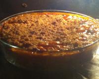 Crumble de parmesan sur lit de courgettes et tomates fondantes, sans oublier la mozzarella.