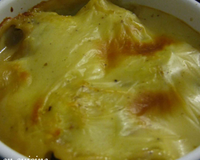 Cocotte gratinée de merlu au fumet de bouchot