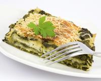 Un gratin d'épinards et de ravioles au fromage à la crème Elle & Vire. Un régal !