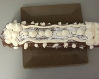 Bûche roulée au chocolat, crème légère saveur pain d'épices
