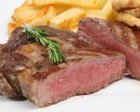 Côte de bœuf grillée à l'échalote et sarments de vignes