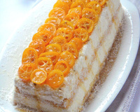 Bûche aux kumquats confits, coco passion, chocolat fleur d'oranger