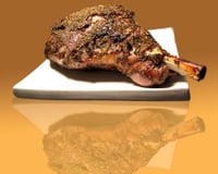 Gigot aux herbes sur lit d'haricots blancs