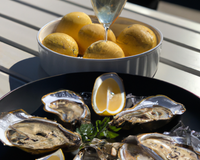 Emincé de barbue et huitres pochées au champagne