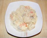 Filet de dinde à la crème façon blanquette, avec carottes, poireaux et champignons ...