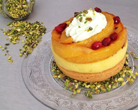 Fond de tarte, crémeux vanille citron vert, mangue rôtie au miel, perles de grenade et chantilly pistache.