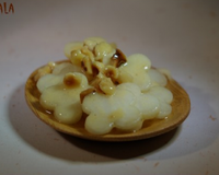 Carpaccio de chou-rave aux noisettes