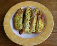 C'est un gratin de courgettes cuisiné avec des courgettes rappées crues et un soupçon de muscade moulue. Une fois cuit, on le coupe en tranche et on intercale des tranches…