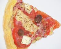 Cette pizza sera parfaite avec une salade verte.