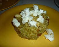 Risotto de poulet au chorizo parsemé de formage de chèvre