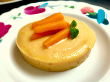 Chérie à la coque, crème de carottes et mouillette au beurre d'orange