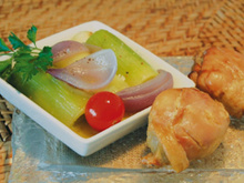 Jambonnette de poulet confite, braisé de blanc de poireaux à la coriandre