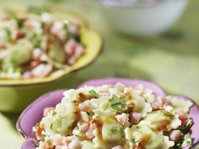 Salade de ravioles aux herbes, jambon cru et vinaigrette à l'orange