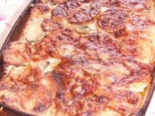 Gratin de pommes de terre au poulet et à l'estragon