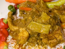 Cochon de lait sauce moambe