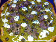 Pizza festive (magret sauce poivre vert)