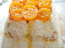 Bûche aux kumquats confits, coco passion, chocolat fleur d'oranger