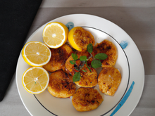 Médaillons de lotte panés aux épices et fine semoule au zeste de citron