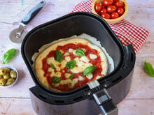 Prête en moins de 15 minutes chrono : découvrez la recette de la pizza au Airfryer qui vous fera oublier votre four pour l’été