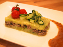 Parmentier de courgettes et agneau au cumin, sauce au thym