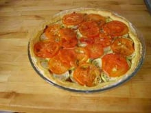 Tarte au chèvre, tomates et courgettes
