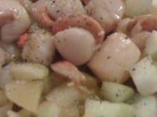 Saint Jacques à la mangue et aux fruits de mer