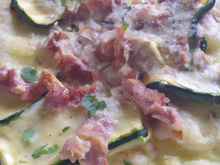 Gratin de ravioles du Dauphiné aux lardons et courgettes