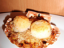 Coquilles Saint-Jacques et fondue de poireaux gratinées