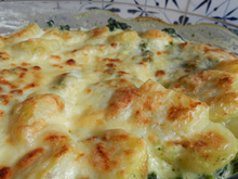 Gratin de pommes de terre, poisson et épinards