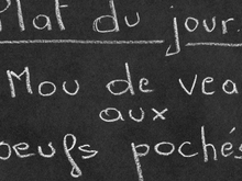 Mou de veau aux œufs pochés