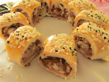 Rouleau de poulet au gruyère en croûte de sésame