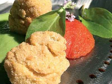 Huîtres d'Arcachon Cap-Ferret panées aux noix du Périgord, crème purée de petits pois à l'estragon et tomates Raf cuisinées