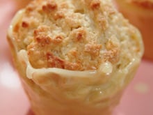 Muffins très 'coco', glacés de chocolat blanc