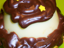 Mes mini délices : mini cheesecake au chocolat blanc citronné sous une pannacotta à l'orange curd, ganache au chocolat noir