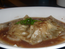 Raviole de foie gras, jus au pain d'épices